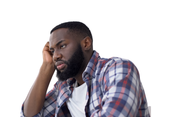 "African-American man experiencing a lack of appetite, possibly due to an eating disorder or depression, which can be factors contributing to infertility in males